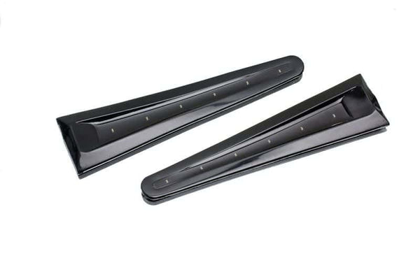 Kolmiona oleva navan korkkipohjainen musta. Sininen on LED