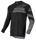 Alpinestars Barn Crosströja Racer Graphite i svart och grå design med långärmad passform, perfekt för motocross och offroad-körning.